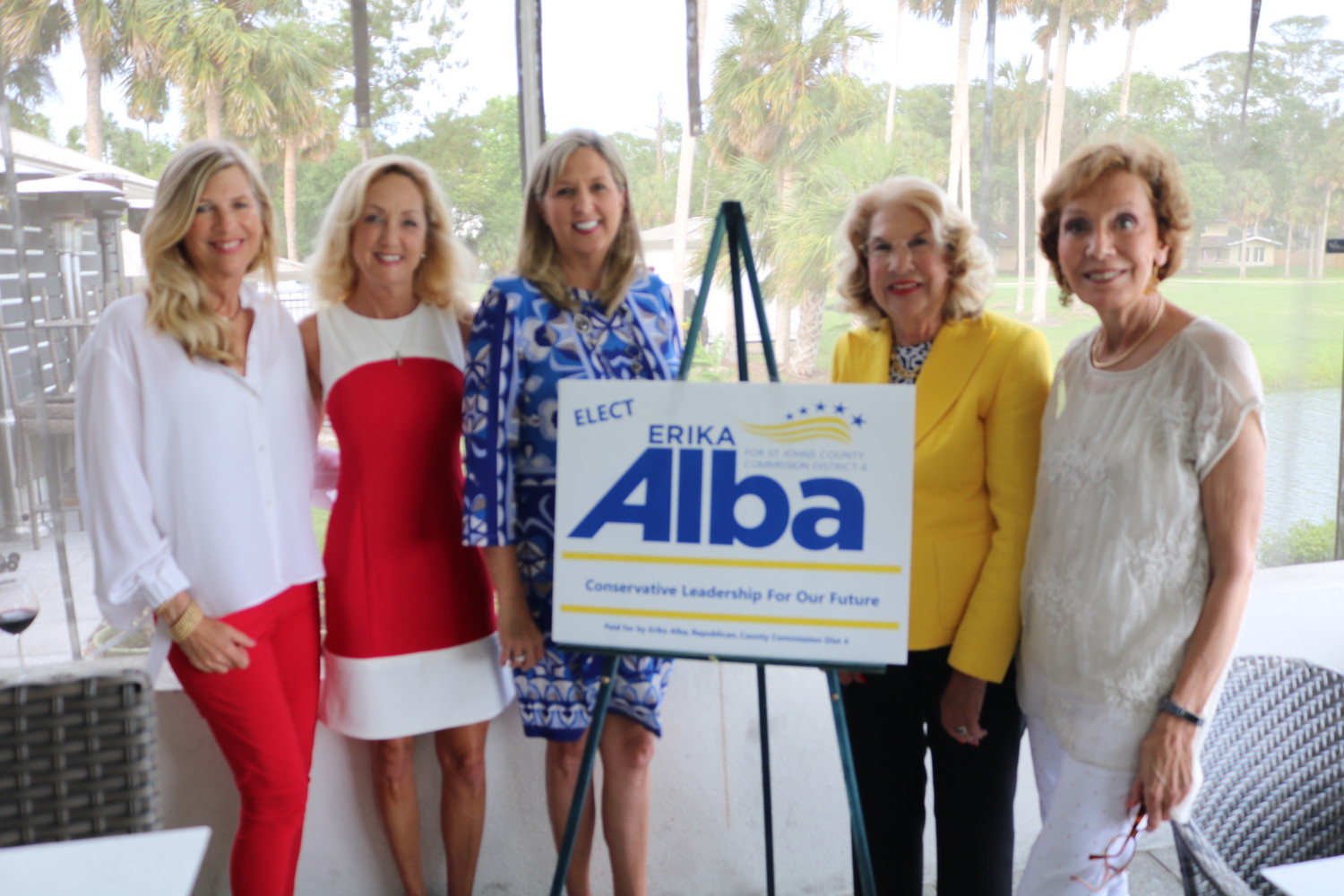 St. Johns County Commission District 4 candidate Erika Alba (center) poses with Pam D. Paul, Diane Scherff, Pam Y. Paul and Earliene Shipper at a reception held Tuesday, May 22 at 3 Palms Grille in support of her campaign.